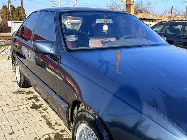 Синий Опель Омега, объемом двигателя 2.4 л и пробегом 271 тыс. км за 1200 $, фото 4 на Automoto.ua