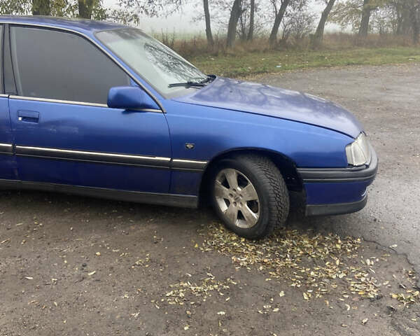 Синий Опель Омега, объемом двигателя 2 л и пробегом 95 тыс. км за 902 $, фото 2 на Automoto.ua