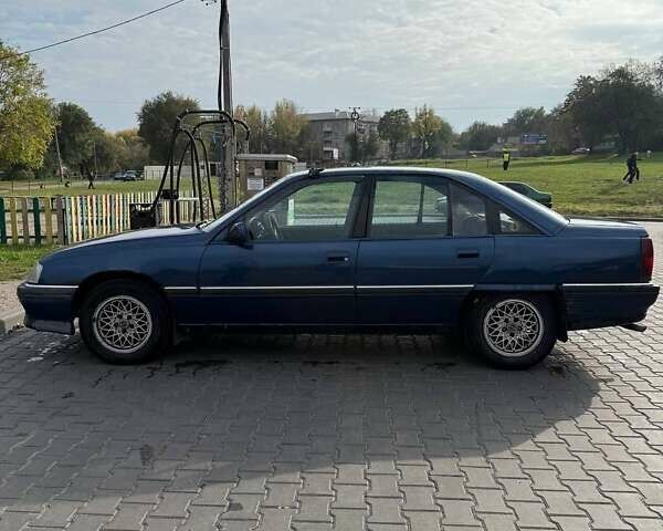 Синий Опель Омега, объемом двигателя 2 л и пробегом 300 тыс. км за 1300 $, фото 3 на Automoto.ua