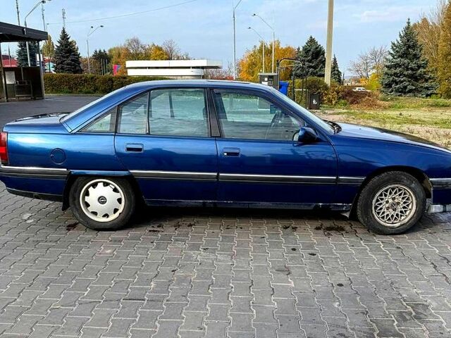 Синий Опель Омега, объемом двигателя 2 л и пробегом 300 тыс. км за 1300 $, фото 1 на Automoto.ua