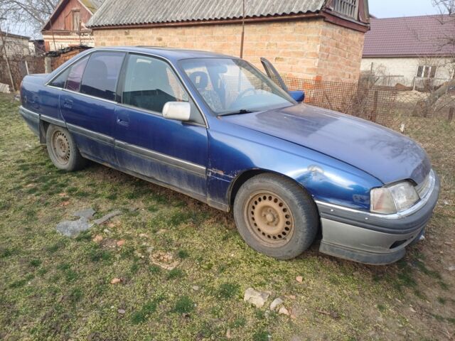 Синий Опель Омега, объемом двигателя 2 л и пробегом 300 тыс. км за 600 $, фото 2 на Automoto.ua