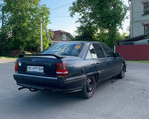 Синий Опель Омега, объемом двигателя 2 л и пробегом 285 тыс. км за 650 $, фото 2 на Automoto.ua