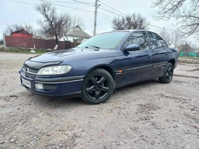 Синий Опель Омега, объемом двигателя 2 л и пробегом 1 тыс. км за 1700 $, фото 11 на Automoto.ua