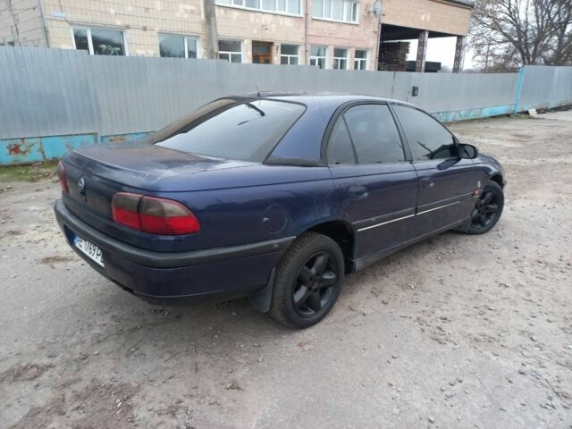 Синій Опель Омега, об'ємом двигуна 2 л та пробігом 1 тис. км за 1700 $, фото 13 на Automoto.ua