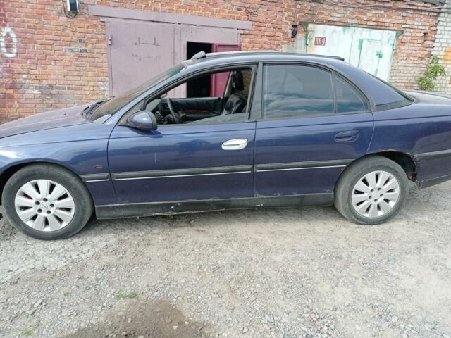 Синий Опель Омега, объемом двигателя 3 л и пробегом 216 тыс. км за 800 $, фото 3 на Automoto.ua