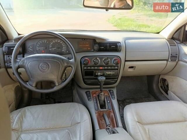 Синий Опель Омега, объемом двигателя 2 л и пробегом 326 тыс. км за 1100 $, фото 4 на Automoto.ua