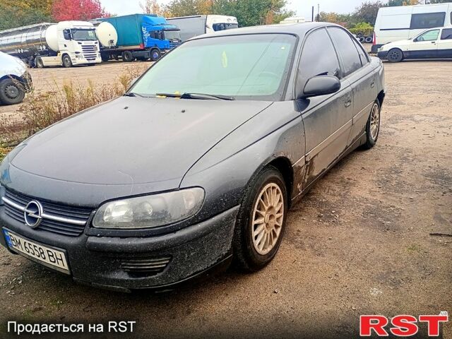 Опель Омега 1994 в Сумах на Automoto.ua Синий Опель Омега, объемом двигателя 2.5 л и пробегом 420 тыс. км за 1600 $, фото 4 на Automoto.ua