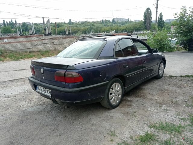 Синий Опель Омега, объемом двигателя 3 л и пробегом 216 тыс. км за 800 $, фото 2 на Automoto.ua