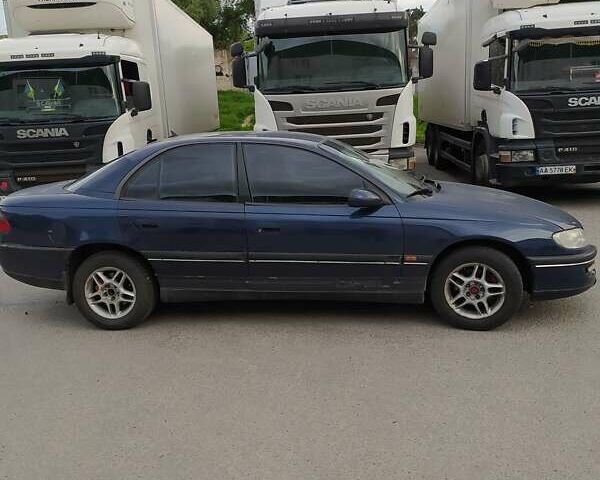 Синий Опель Омега, объемом двигателя 2 л и пробегом 350 тыс. км за 2800 $, фото 15 на Automoto.ua