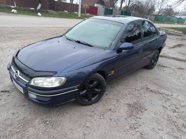 Синій Опель Омега, об'ємом двигуна 2 л та пробігом 1 тис. км за 1700 $, фото 12 на Automoto.ua