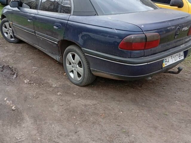 Синий Опель Омега, объемом двигателя 0 л и пробегом 450 тыс. км за 650 $, фото 4 на Automoto.ua