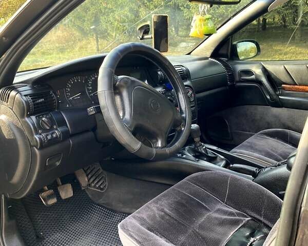 Синий Опель Омега, объемом двигателя 2 л и пробегом 487 тыс. км за 3000 $, фото 9 на Automoto.ua