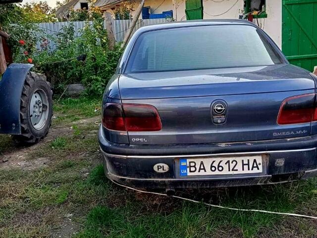 Синий Опель Омега, объемом двигателя 2.5 л и пробегом 400 тыс. км за 3500 $, фото 1 на Automoto.ua