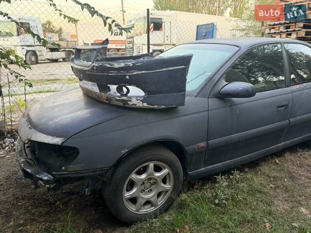 Синий Опель Омега, объемом двигателя 3 л и пробегом 560 тыс. км за 1500 $, фото 4 на Automoto.ua