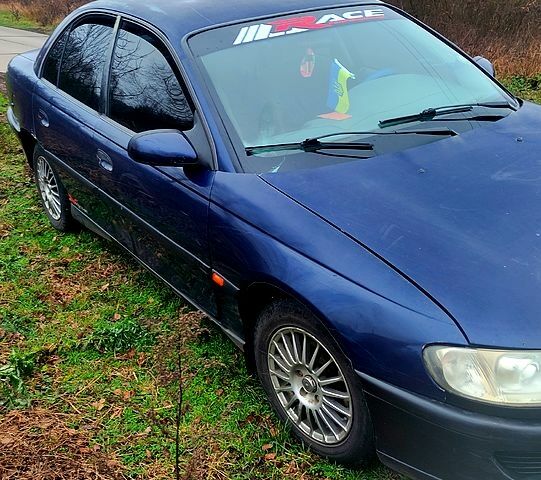 Синий Опель Омега, объемом двигателя 2.5 л и пробегом 320 тыс. км за 1800 $, фото 4 на Automoto.ua