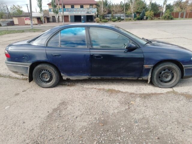 Синій Опель Омега, об'ємом двигуна 2 л та пробігом 383 тис. км за 1441 $, фото 4 на Automoto.ua