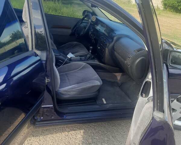 Синій Опель Омега, об'ємом двигуна 2 л та пробігом 305 тис. км за 3300 $, фото 7 на Automoto.ua