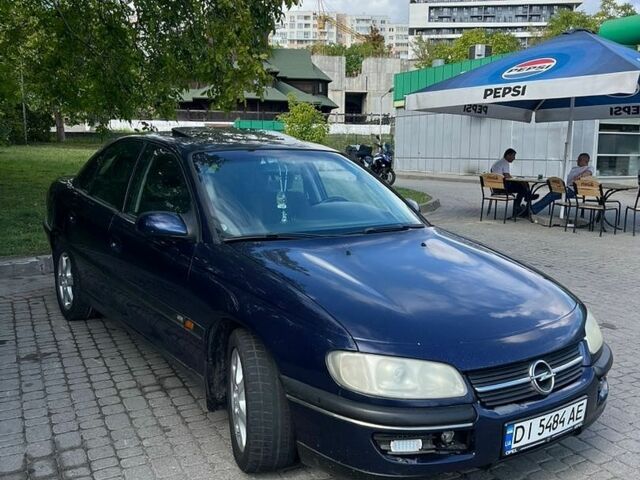 Синий Опель Омега, объемом двигателя 0 л и пробегом 350 тыс. км за 2100 $, фото 1 на Automoto.ua