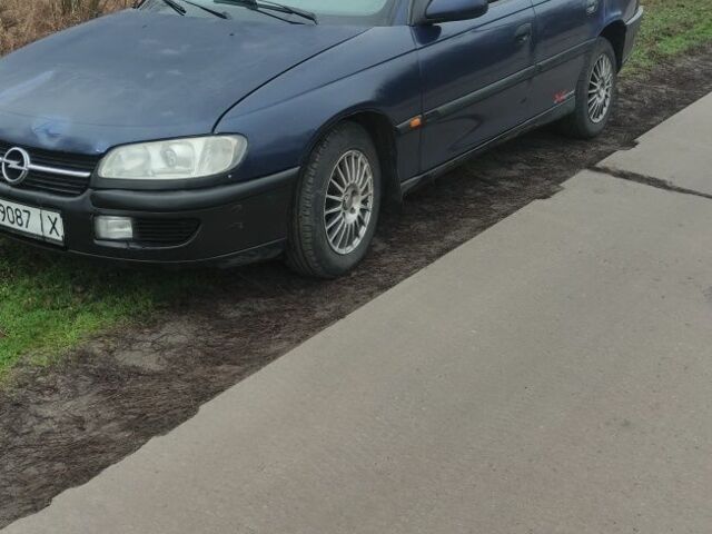 Синий Опель Омега, объемом двигателя 2.5 л и пробегом 320 тыс. км за 1800 $, фото 1 на Automoto.ua