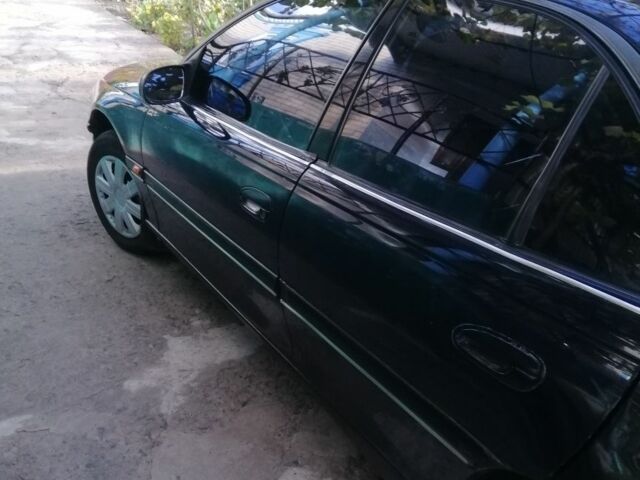 Синий Опель Омега, объемом двигателя 2 л и пробегом 270 тыс. км за 3000 $, фото 3 на Automoto.ua