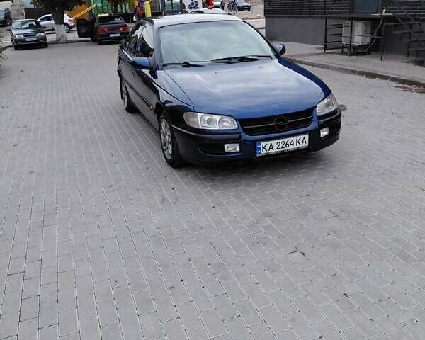 Синий Опель Омега, объемом двигателя 2 л и пробегом 300 тыс. км за 1599 $, фото 4 на Automoto.ua