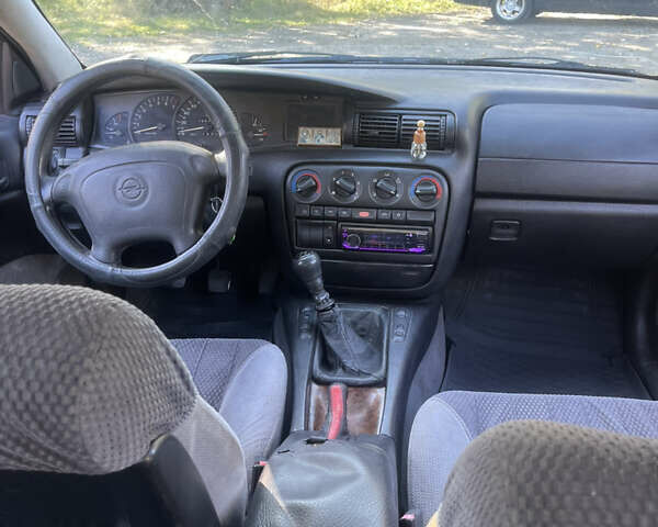 Синий Опель Омега, объемом двигателя 2.5 л и пробегом 480 тыс. км за 1799 $, фото 14 на Automoto.ua