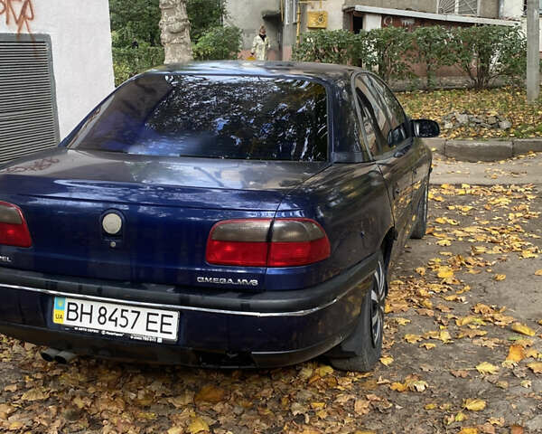 Синий Опель Омега, объемом двигателя 3 л и пробегом 422 тыс. км за 2200 $, фото 3 на Automoto.ua