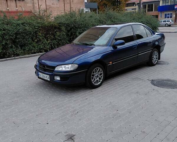 Синий Опель Омега, объемом двигателя 2 л и пробегом 300 тыс. км за 1599 $, фото 5 на Automoto.ua
