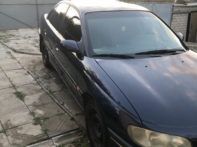 Синій Опель Омега, об'ємом двигуна 2.5 л та пробігом 330 тис. км за 900 $, фото 2 на Automoto.ua