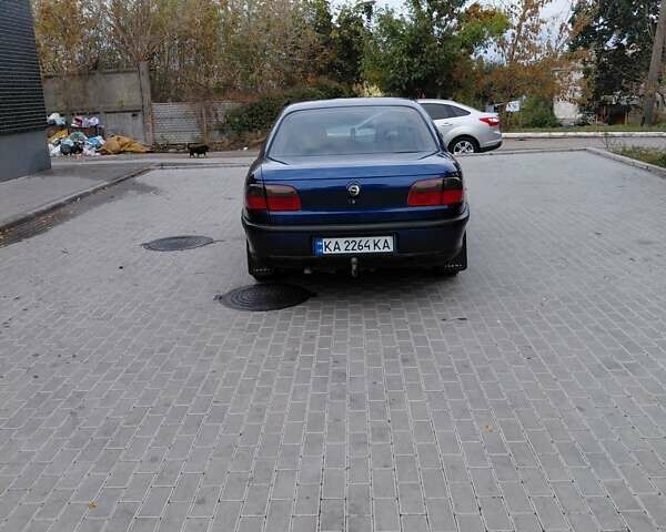 Синий Опель Омега, объемом двигателя 2 л и пробегом 300 тыс. км за 1599 $, фото 7 на Automoto.ua