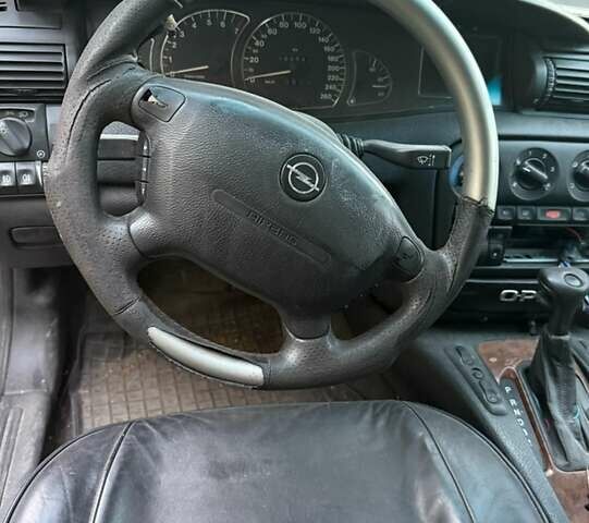 Синий Опель Омега, объемом двигателя 3 л и пробегом 560 тыс. км за 1500 $, фото 16 на Automoto.ua