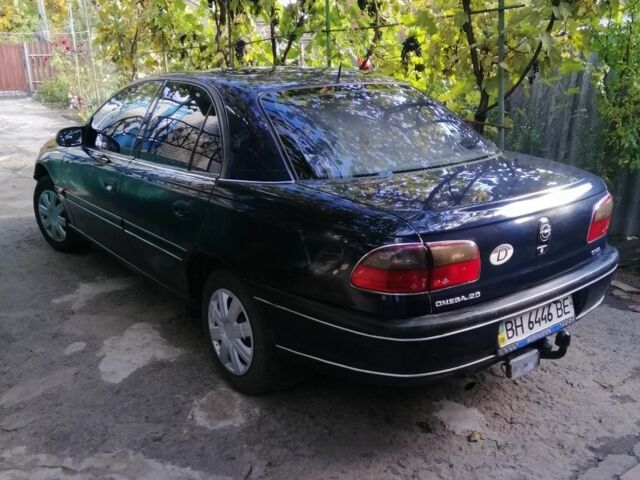 Синій Опель Омега, об'ємом двигуна 2 л та пробігом 270 тис. км за 2500 $, фото 2 на Automoto.ua