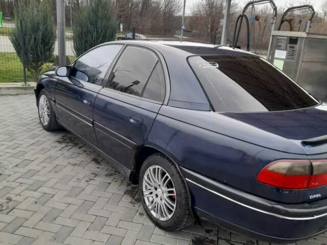 Синий Опель Омега, объемом двигателя 2 л и пробегом 350 тыс. км за 2800 $, фото 5 на Automoto.ua