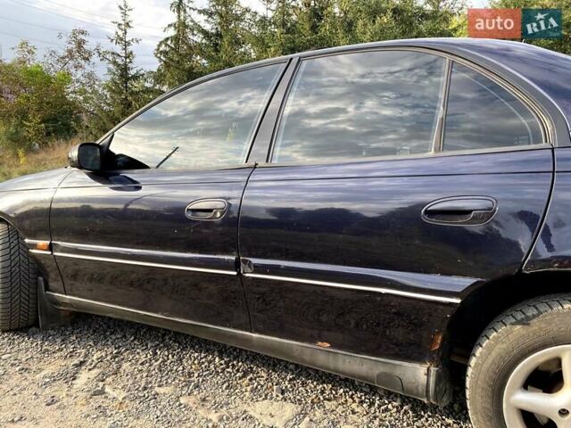Синий Опель Омега, объемом двигателя 2 л и пробегом 487 тыс. км за 3000 $, фото 8 на Automoto.ua