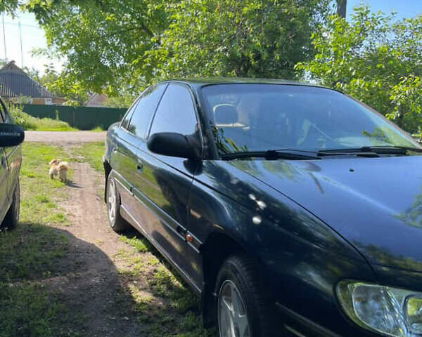 Синій Опель Омега, об'ємом двигуна 2 л та пробігом 30 тис. км за 1650 $, фото 4 на Automoto.ua