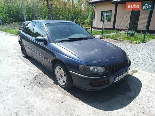 Синий Опель Омега, объемом двигателя 2.5 л и пробегом 350 тыс. км за 1600 $, фото 1 на Automoto.ua