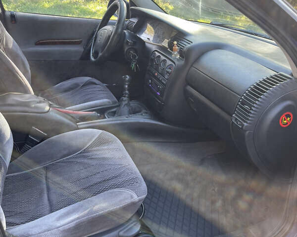 Синий Опель Омега, объемом двигателя 2.5 л и пробегом 480 тыс. км за 1799 $, фото 13 на Automoto.ua