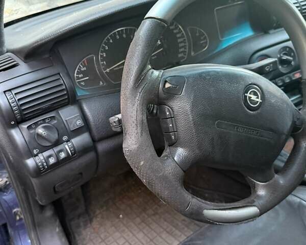 Синий Опель Омега, объемом двигателя 3 л и пробегом 560 тыс. км за 1500 $, фото 17 на Automoto.ua