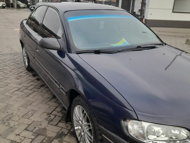 Синий Опель Омега, объемом двигателя 2 л и пробегом 350 тыс. км за 2800 $, фото 1 на Automoto.ua