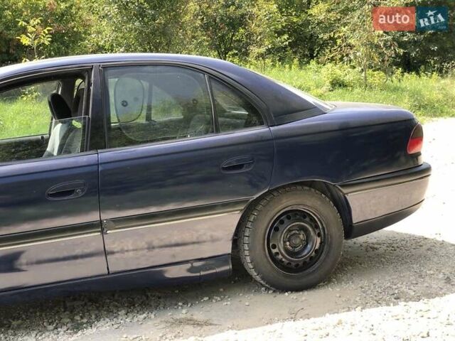 Синій Опель Омега, об'ємом двигуна 2 л та пробігом 256 тис. км за 1600 $, фото 16 на Automoto.ua