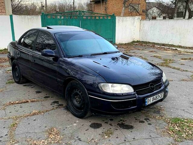 Синий Опель Омега, объемом двигателя 2 л и пробегом 200 тыс. км за 2300 $, фото 3 на Automoto.ua