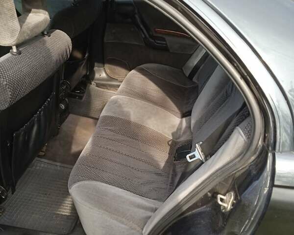 Синий Опель Омега, объемом двигателя 2.5 л и пробегом 297 тыс. км за 2000 $, фото 7 на Automoto.ua