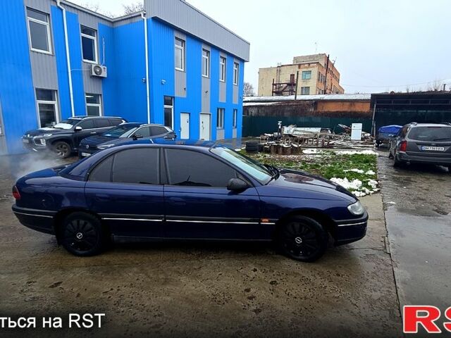 Синій Опель Омега, об'ємом двигуна 2 л та пробігом 345 тис. км за 2800 $, фото 2 на Automoto.ua