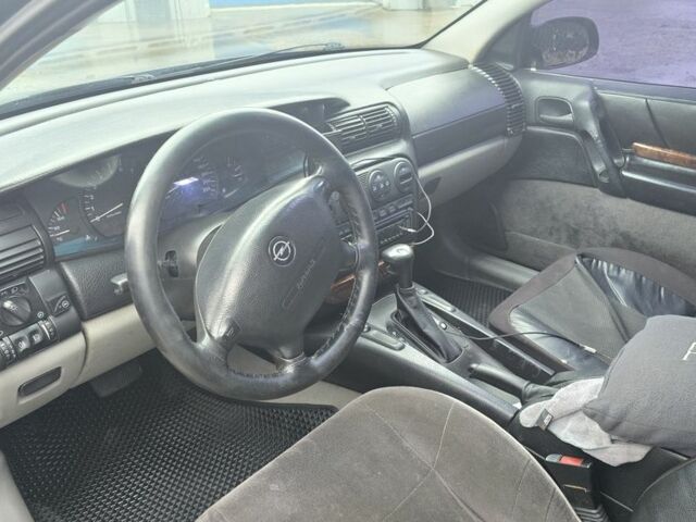 Синий Опель Омега, объемом двигателя 2 л и пробегом 345 тыс. км за 2800 $, фото 5 на Automoto.ua