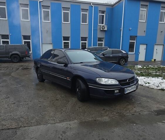 Синий Опель Омега, объемом двигателя 2 л и пробегом 345 тыс. км за 2800 $, фото 4 на Automoto.ua