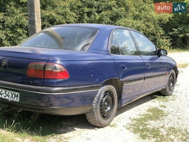 Синій Опель Омега, об'ємом двигуна 2 л та пробігом 256 тис. км за 1600 $, фото 3 на Automoto.ua