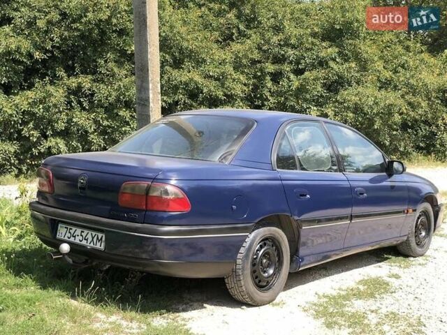 Синій Опель Омега, об'ємом двигуна 2 л та пробігом 256 тис. км за 1600 $, фото 18 на Automoto.ua