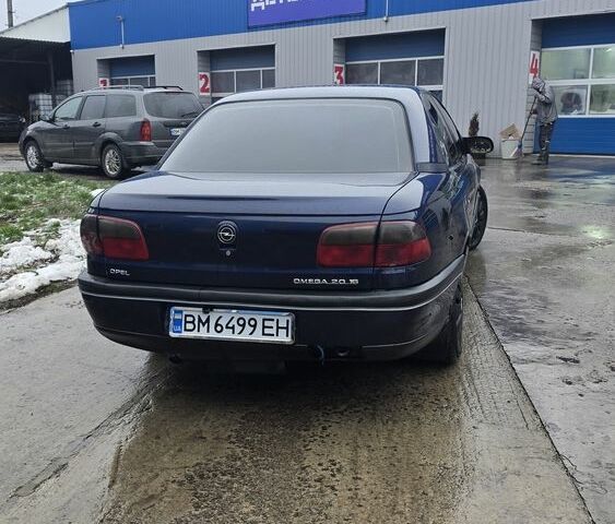 Синий Опель Омега, объемом двигателя 2 л и пробегом 345 тыс. км за 2800 $, фото 2 на Automoto.ua