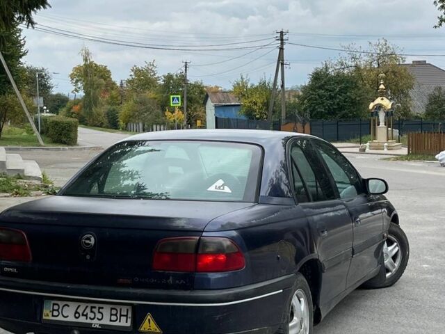 Синий Опель Омега, объемом двигателя 2 л и пробегом 380 тыс. км за 1305 $, фото 4 на Automoto.ua