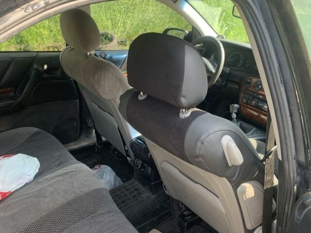 Синий Опель Омега, объемом двигателя 2.5 л и пробегом 133 тыс. км за 1400 $, фото 6 на Automoto.ua